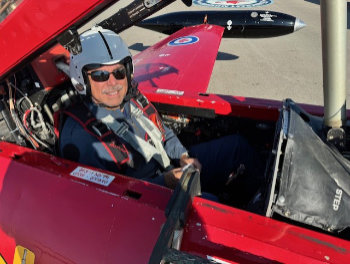 Terry Hawes, son of 1967 & 1969 Crew Chief Bob Hawes, flys in the back seat of the JAM Red Knight T-33