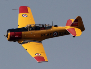 Tex Deagnon flying in Jim Hyrmack's Harvard Trainer Fairmont Hot Springs